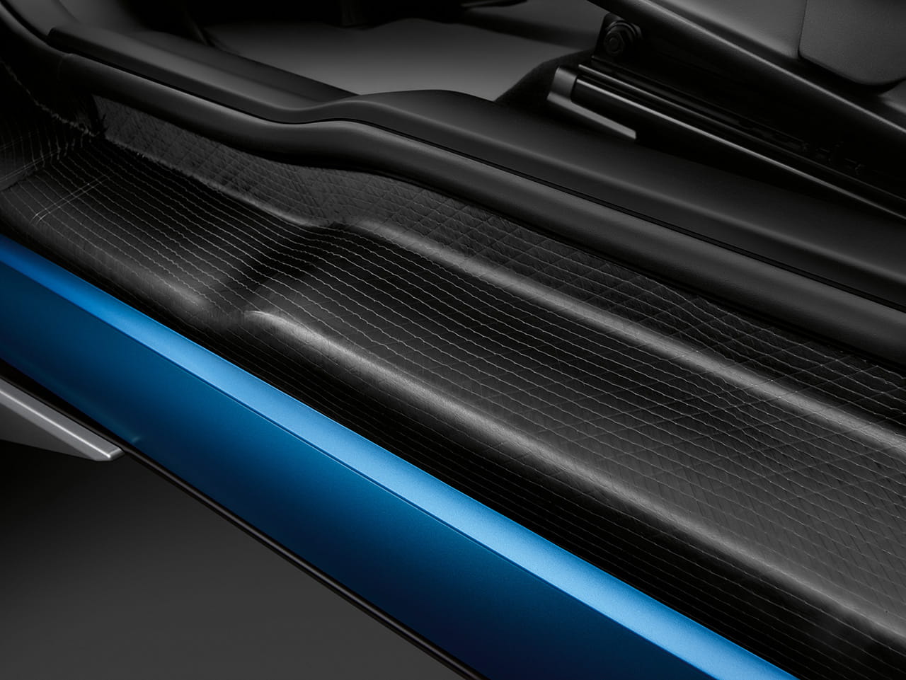 Vista parcial del motor BMW i3 destacando la textura y componentes.