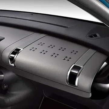 Vista de la original guantera del C4 Cactus, diseño que prioriza la simplicidad y el estilo.