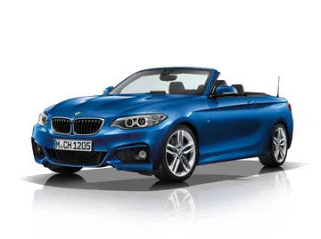 Vista lateral del BMW Serie 2 Cabrio mostrando su línea dinámica y deportiva.
