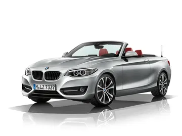 BMW Serie 2 Cabrio con capota abierta, mostrando su diseño lateral y frontal.