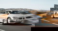 Vista lateral en movimiento del BMW Serie 4 Gran Coupé, destacando su línea deportiva.