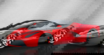 Vista lateral del Ferrari LaFerrari destacando su aerodinámica y diseño agresivo.
