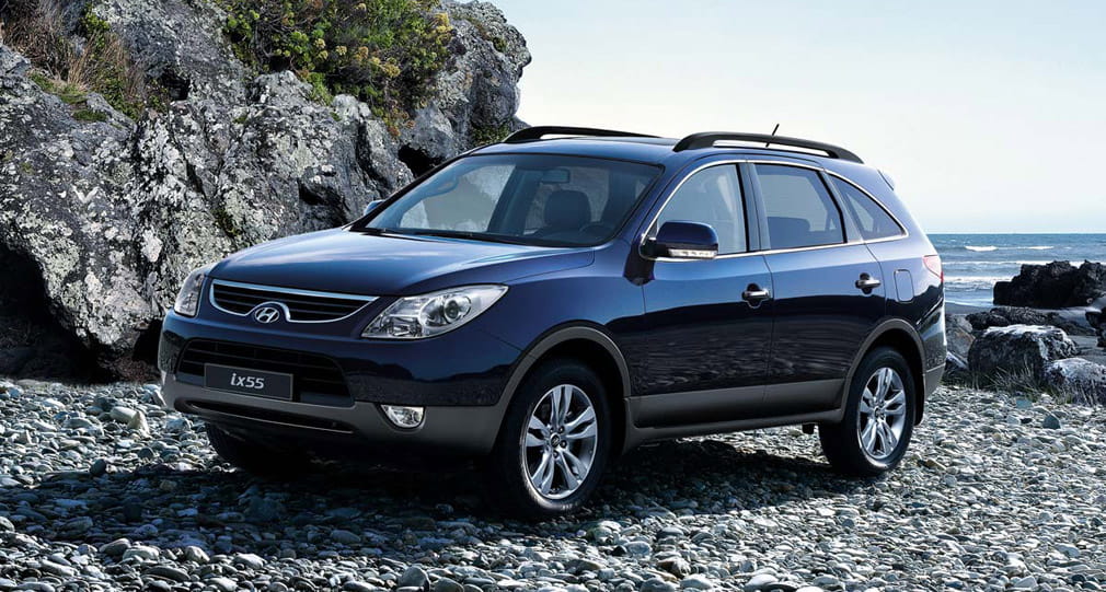 Vista lateral del Hyundai ix55 destacando su diseño y proporciones. Vista lateral del Hyundai ix55 destacando su diseño y proporciones.