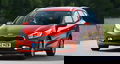 Kia Cee'd Sporty Wagon en movimiento mostrando su diseño frontal y lateral.