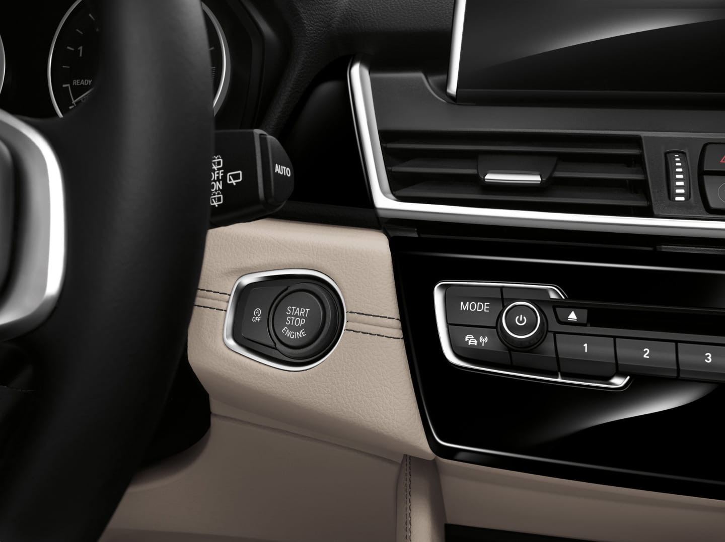 Vista cercana de los botones del sistema multimedia del BMW Serie 2.