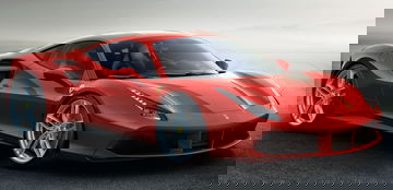 Vista lateral Ferrari 488 en tono rojo vibrante, diseño aerodinámico.