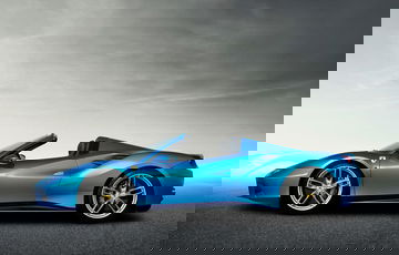 Vista lateral del Ferrari 488 Spider destacando su diseño aerodinámico.