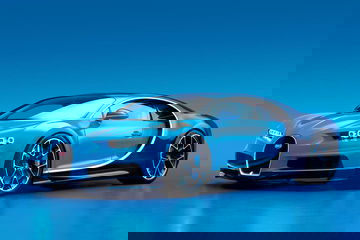 Vista lateral del Bugatti Chiron en color azul destacando su diseño aerodinámico.
