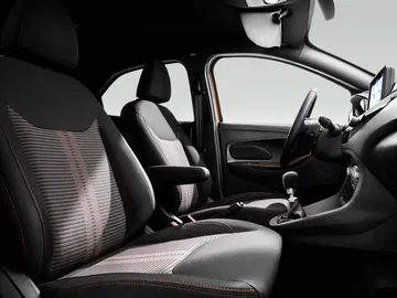 Vista elegante del interior del Ford Ka, destacando asientos y ergonomía.