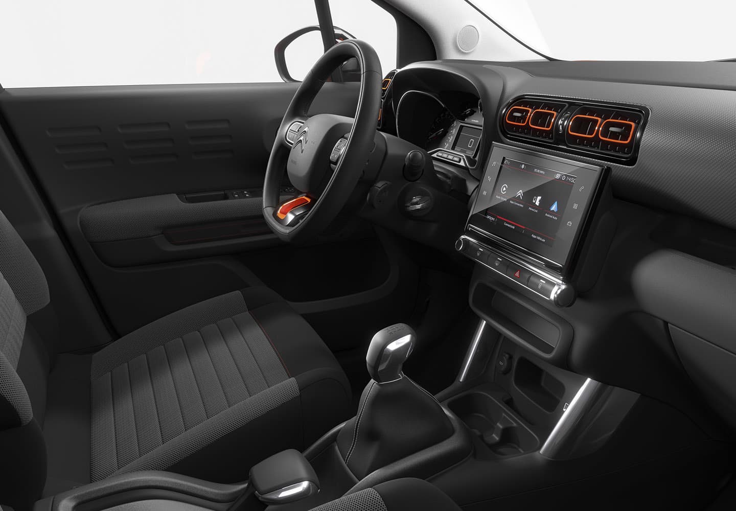 Vista interior enfocando asientos y detalle del salpicadero. Ergonomía y estilo moderno.