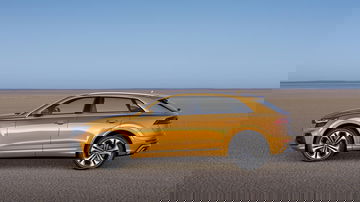 Vista lateral del Audi Q8 destacando su línea de diseño dinámica.