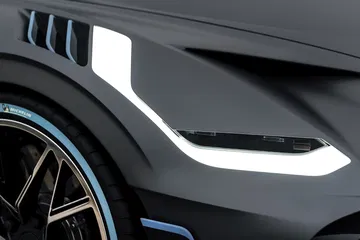 Vista cercana del diseño y luz LED del faro del Bugatti Divo.