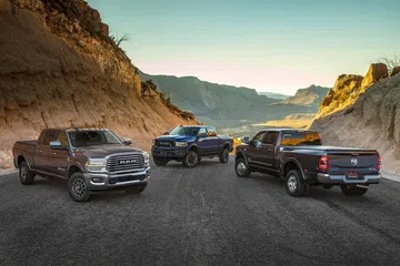 2019 Ram 2500 Heavy Duty Longhorn Mega Cab (left), Power Wagon (