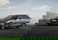 Vista lateral del Audi A4 Limousine resaltando su diseño aerodinámico y líneas elegantes.