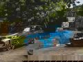 Vista lateral del BMW X6 mostrando su perfil dinámico y deportivo.