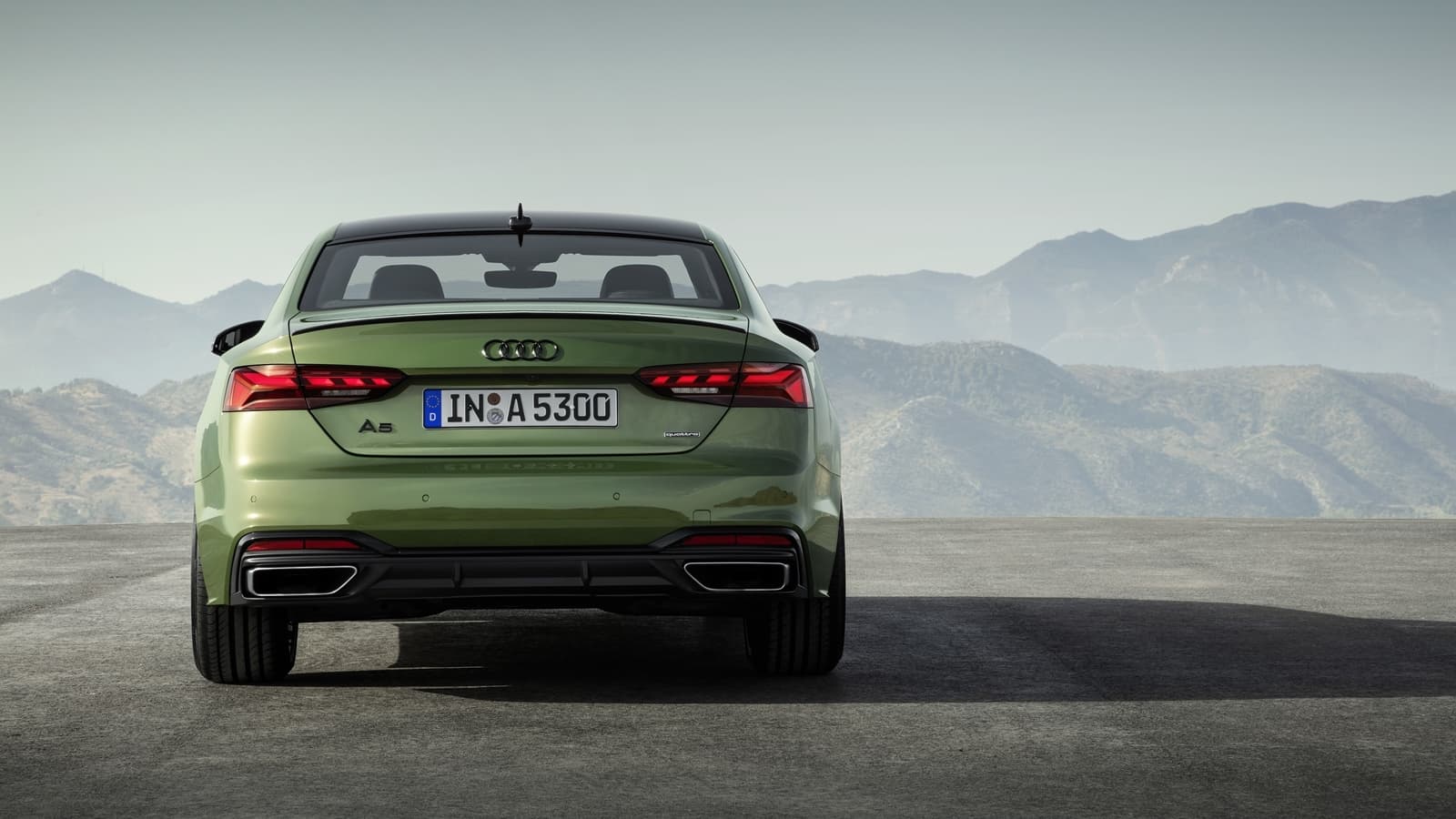 Vista trasera del Audi A5 Coupé destacando su diseño deportivo.