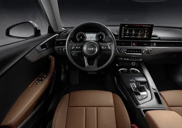 Vista del cockpit del Audi A5 con acabados premium y tecnología avanzada.