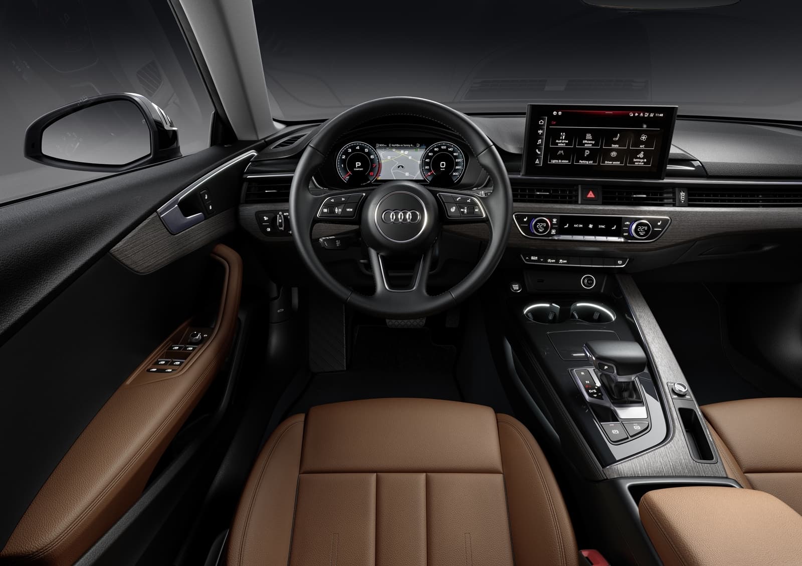 Vista del cockpit del Audi A5 con acabados premium y tecnología avanzada.
