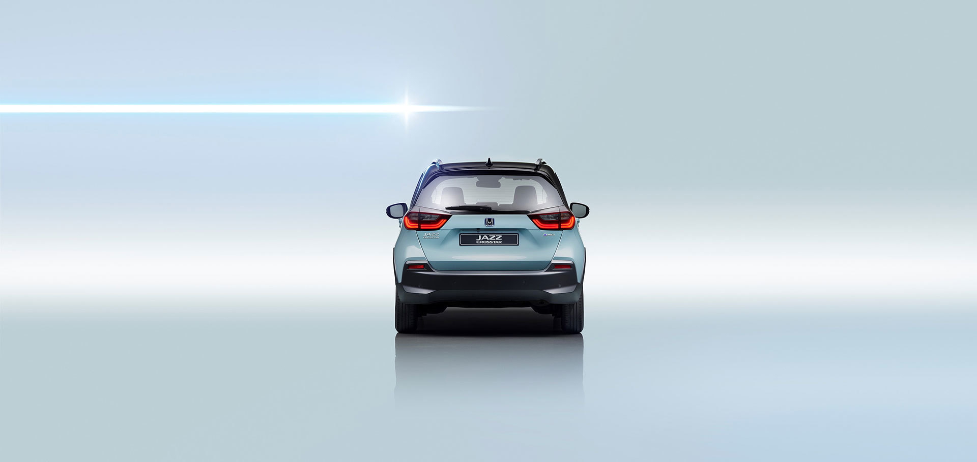 Vista trasera del Honda Jazz destacando sus ópticas y diseño de parachoques.