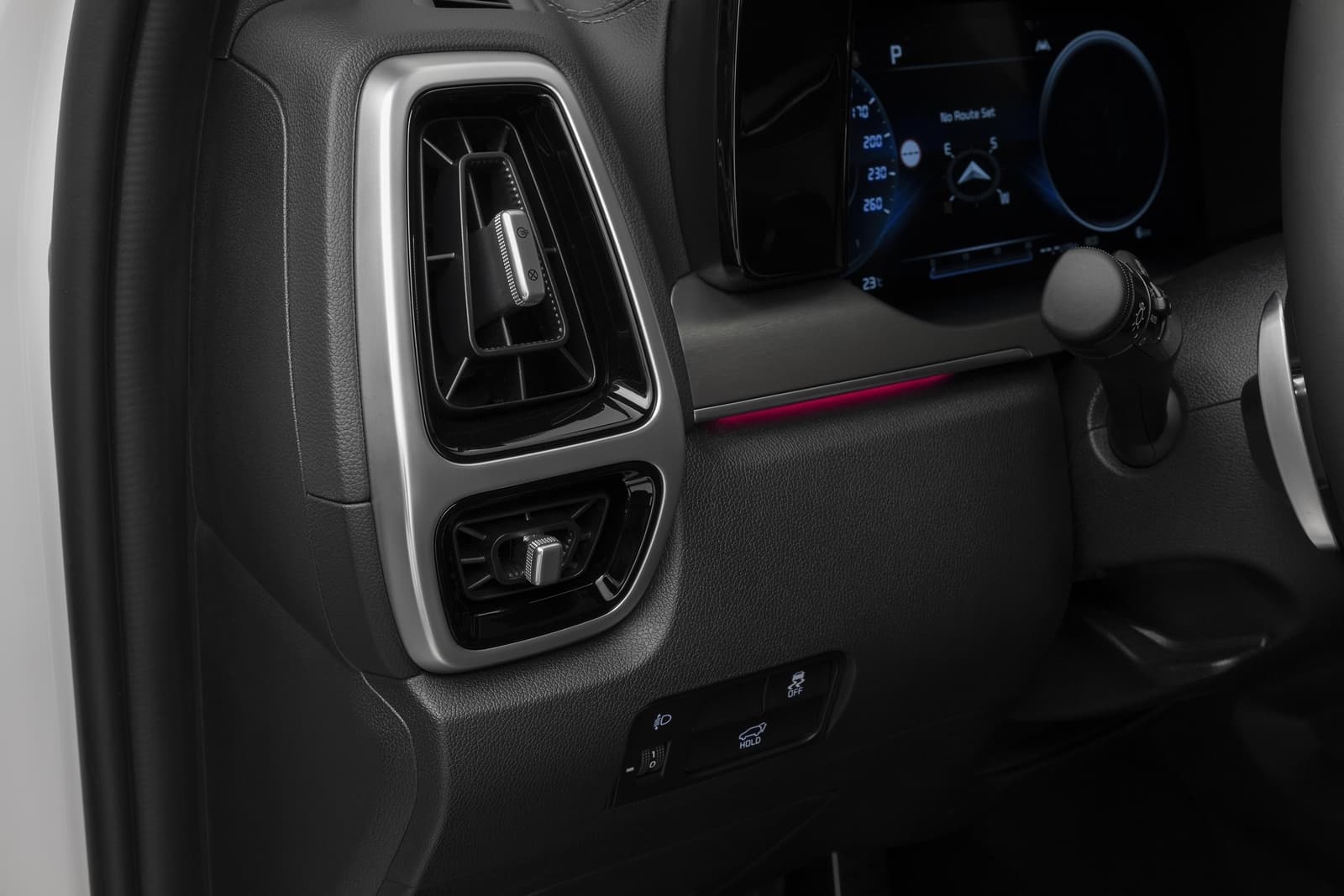 Vista del panel de control de la puerta con ajustes para los espejos y ventanas.