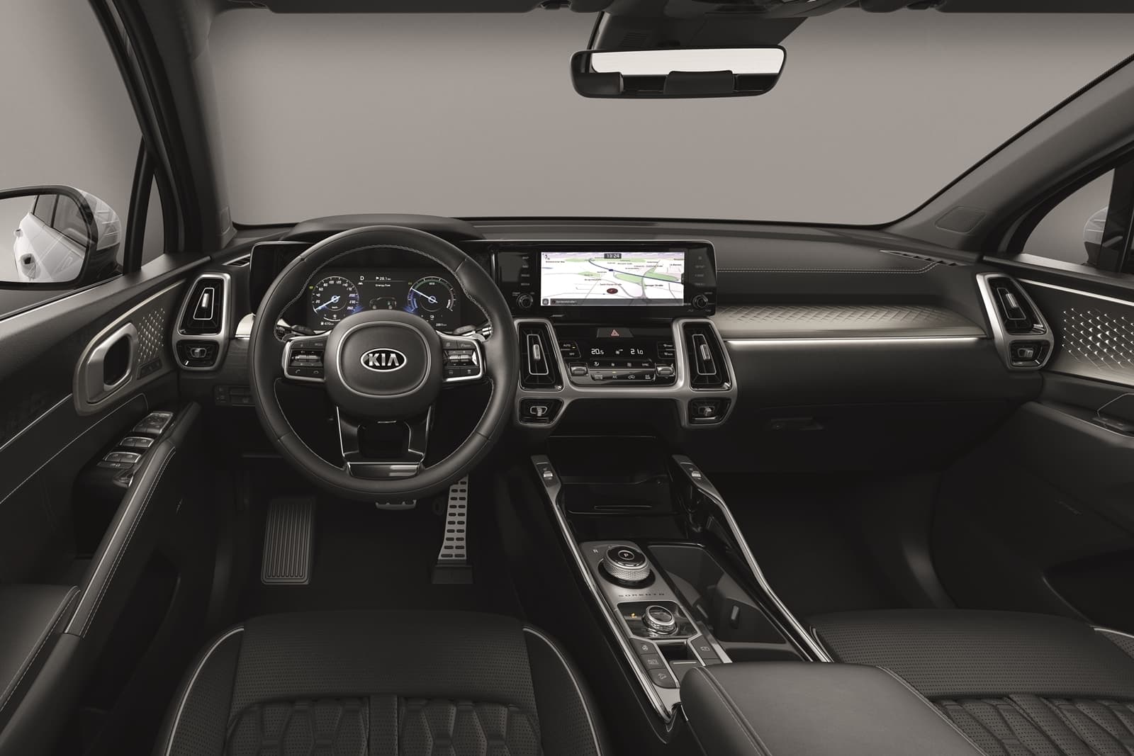 Vista del volante y consola central del Kia Sorento, destacando su ergonomía y diseño.