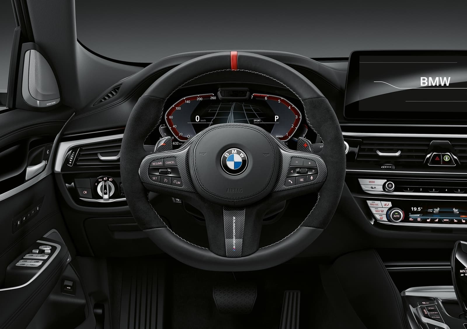 Volante multifunción con controles integrados y emblema BMW.