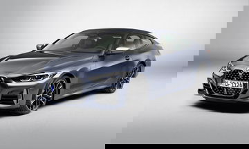 Vista frontal y lateral del BMW Serie 4, destacando su icónica parrilla y diseño aerodinámico.