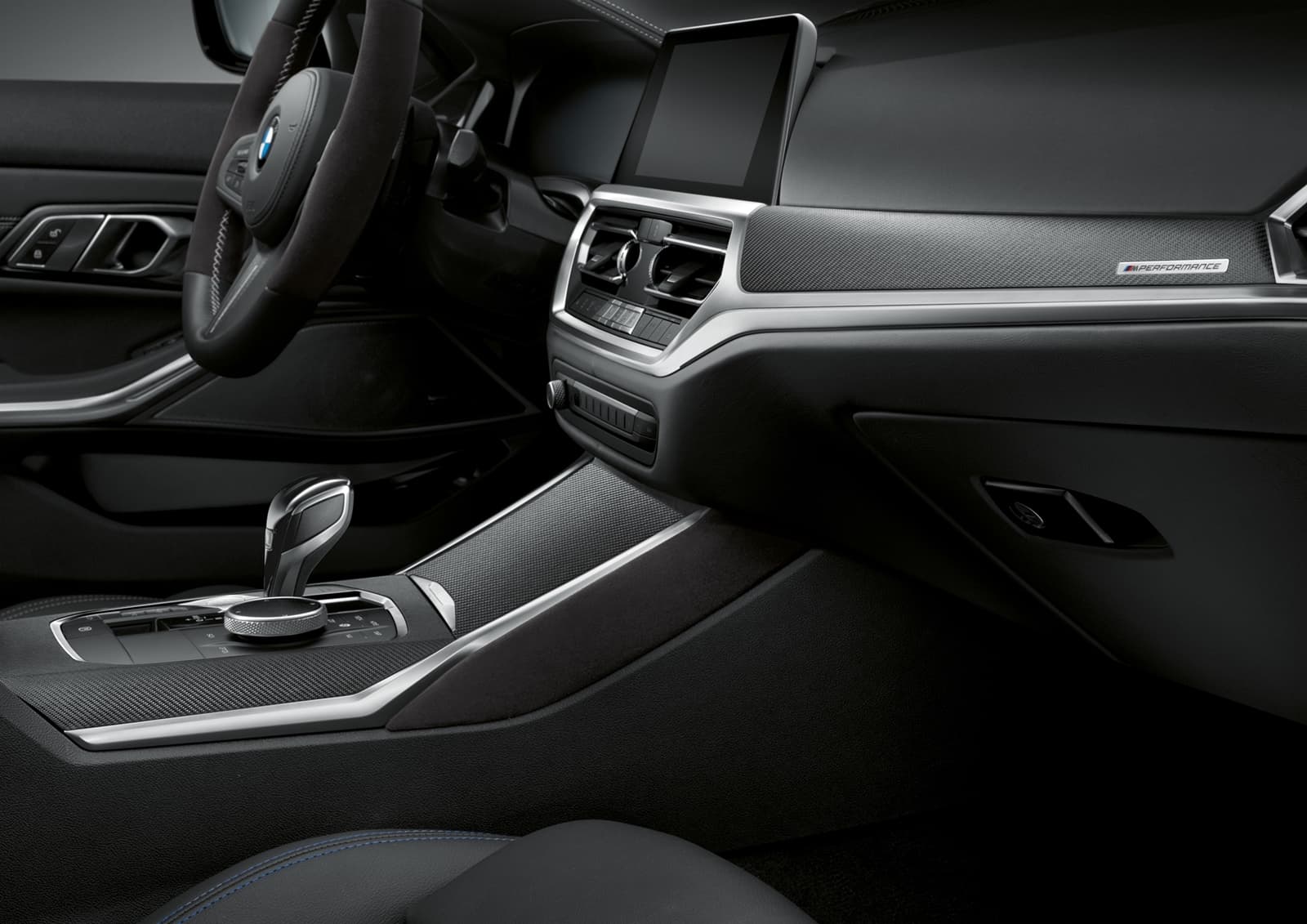 Vista de la consola central del BMW Serie 4, destacando su elegante diseño.