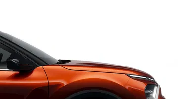 Vista lateral que enfatiza la línea de diseño y color del Citroën C4.