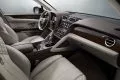 Vista del lujoso interior del Bentley Bentayga, destacando su refinada artesanía.