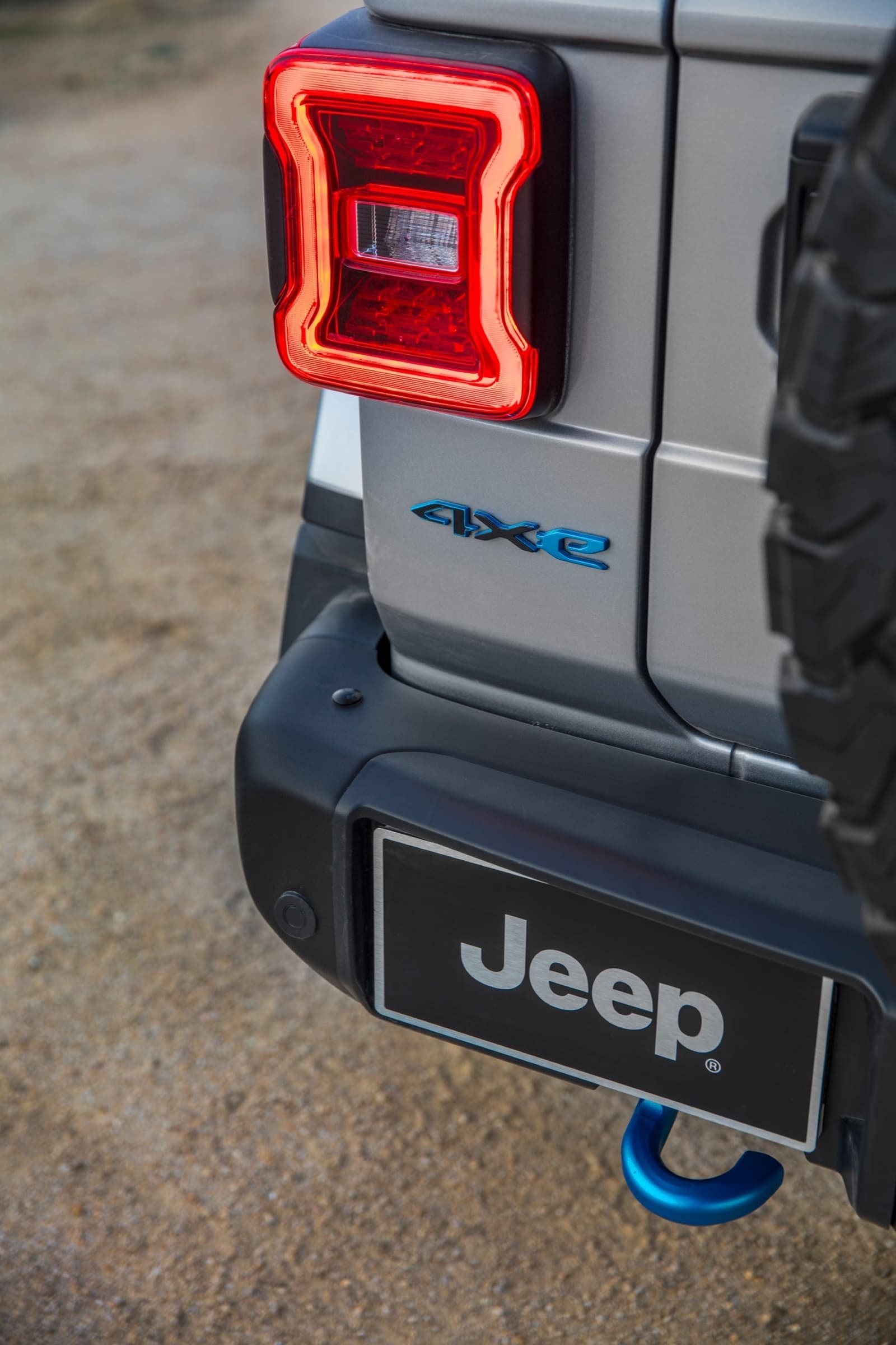 Surf Blue Accents The 4xe Badge And Tow Hooks On The 2021 Jeep®
