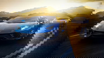 Vista dinámica del Aventador adelantando con el sol al fondo