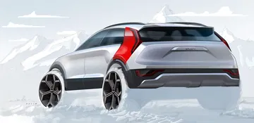 Vista de perfil y trasero del Kia Niro, destacando su moderna línea de diseño