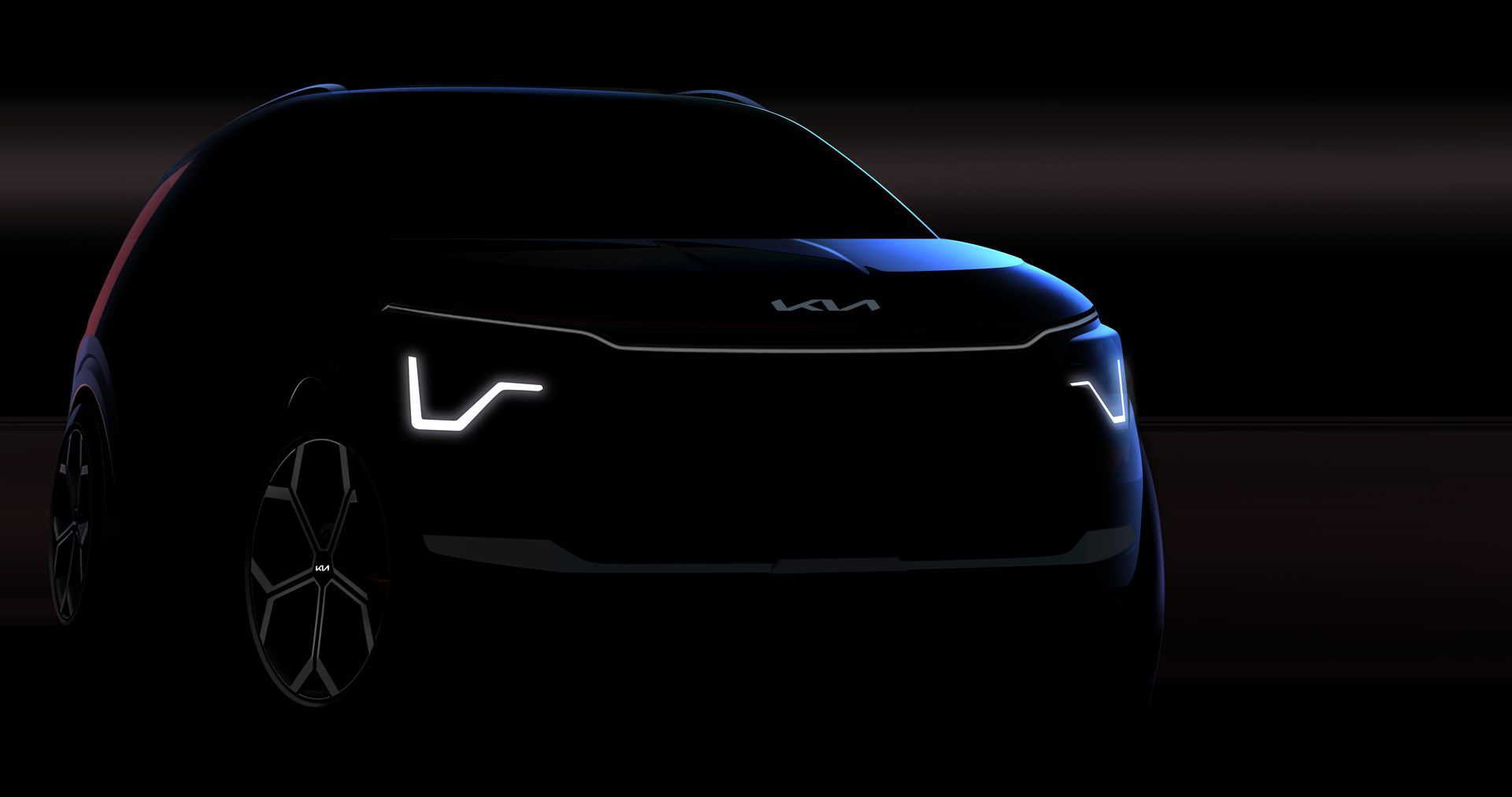 Vista lateral delantera del Kia Niro, destacando su línea de LEDs diurnos.