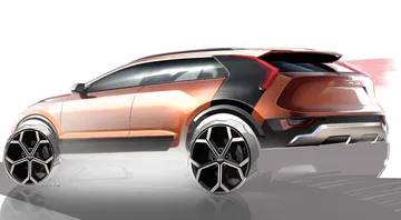 Diseño audaz del nuevo Kia Niro, destacando su línea de techo y llantas.