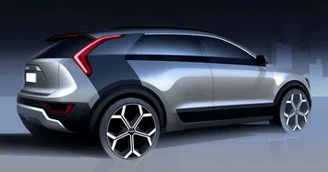 Vista lateral del Kia Niro resaltando su línea dinámica y moderna.