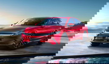 Vista dinámica del BYD Han destacando su diseño aerodinámico.