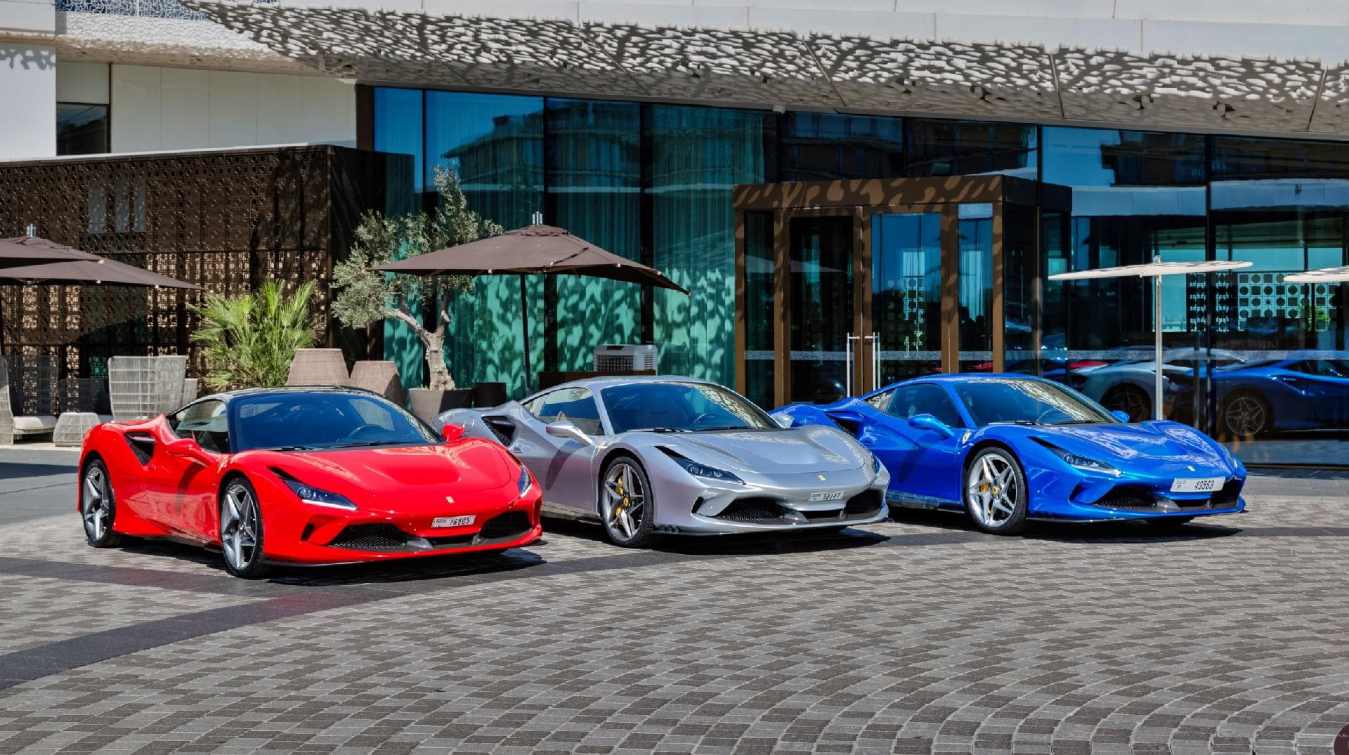 How many Ferrari, McLaren and similar cars were sold in