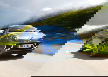 5 Coches Eclipsados Hermanos Renault Wind 01