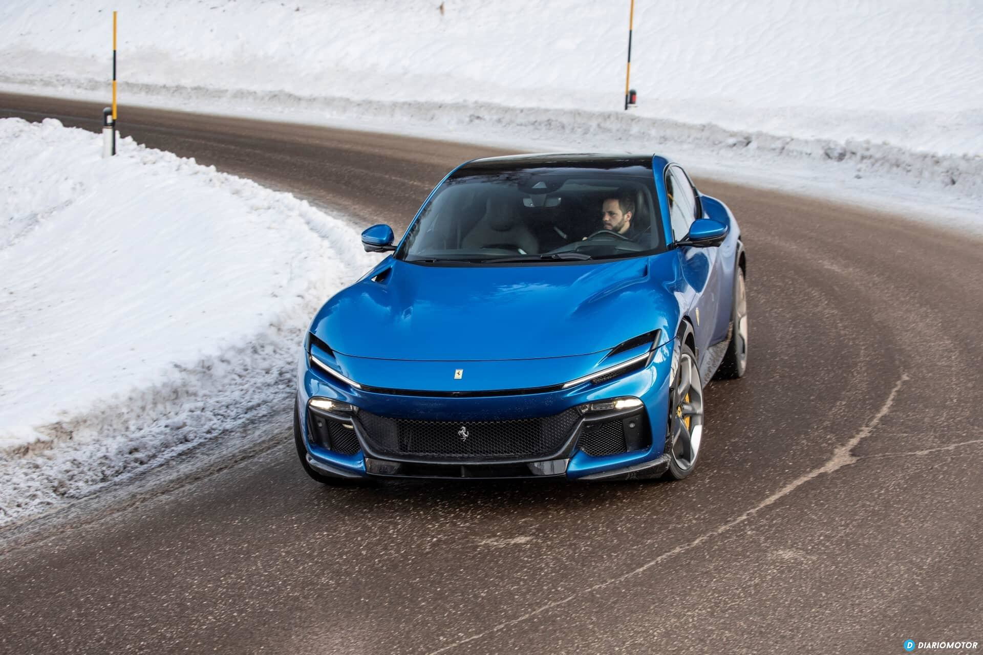 Vista dinámica del Purosangue abrazando curvas nevadas.