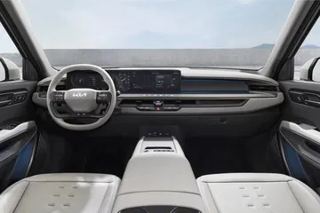 Vista del tablero del KIA EV9, destacando su diseño minimalista y tecnológico