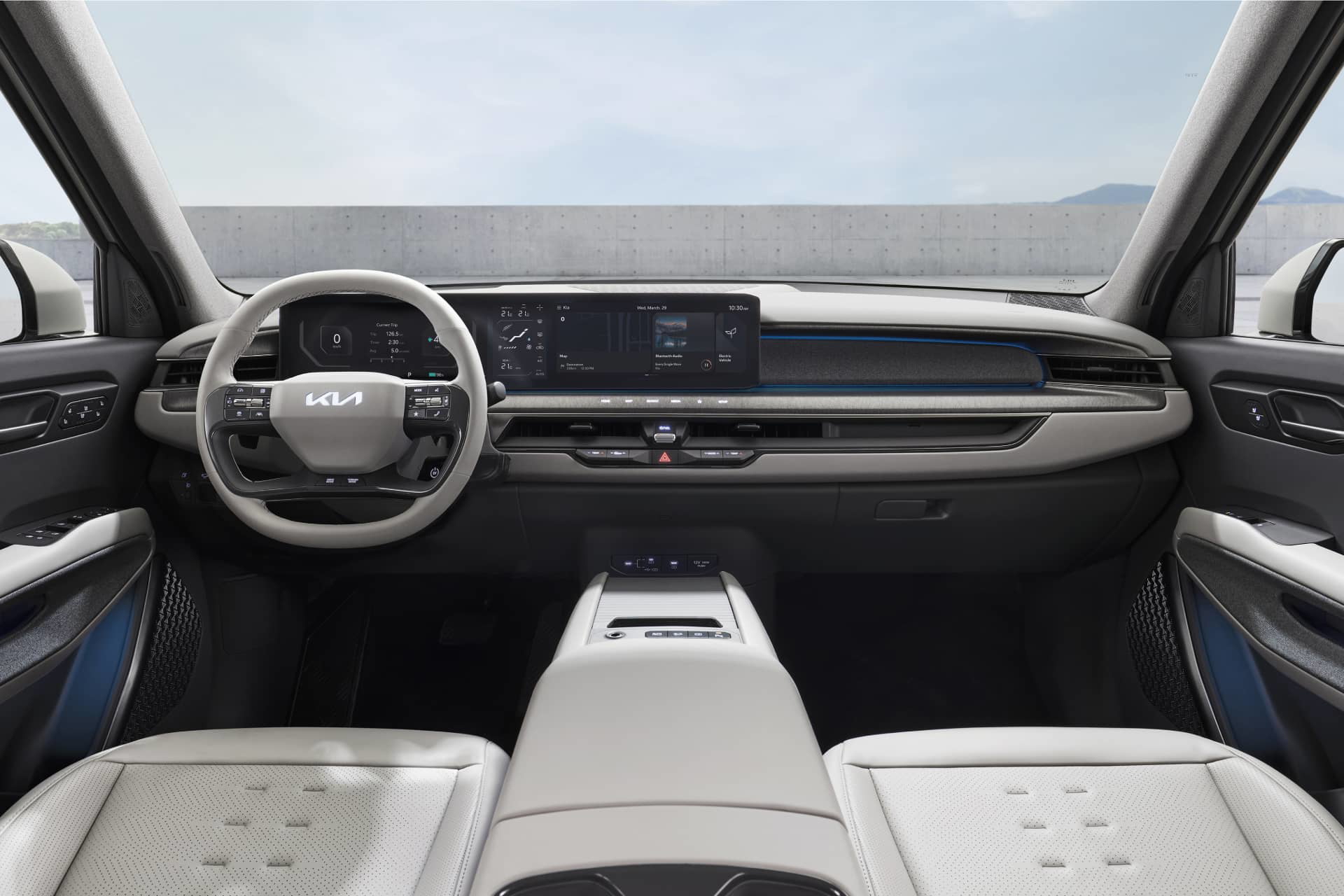 Vista del tablero del KIA EV9, destacando su diseño minimalista y tecnológico