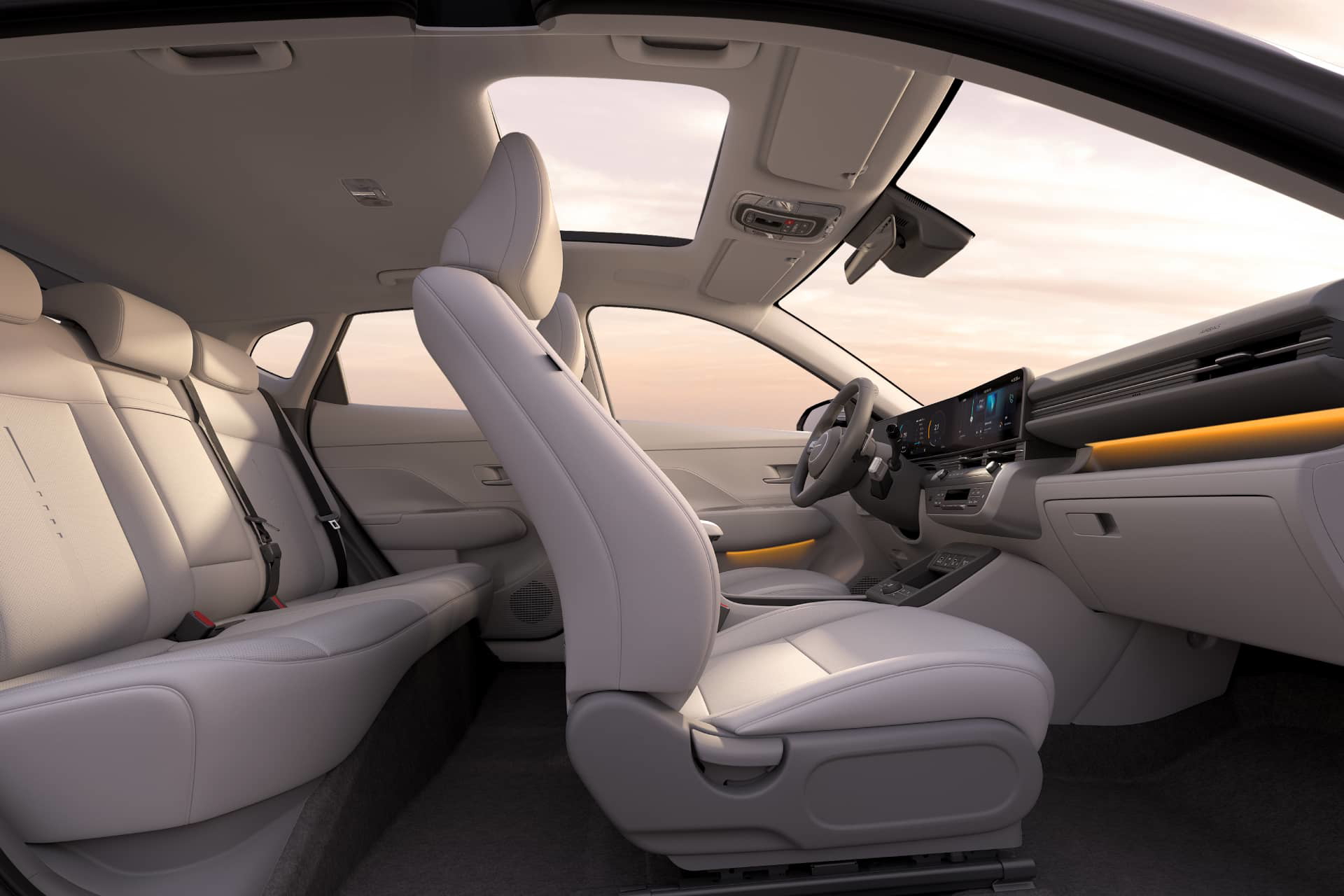 Vista lateral del habitáculo resaltando la comodidad y acabados de los asientos.