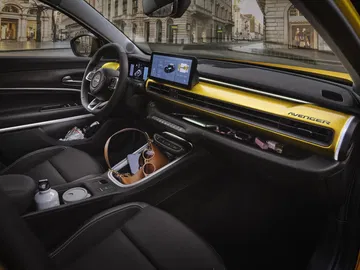 Puesto de conducción del Jeep Avenger con acabados modernos y pantalla táctil. Puesto de conducción del Jeep Avenger con acabados modernos y pantalla táctil.