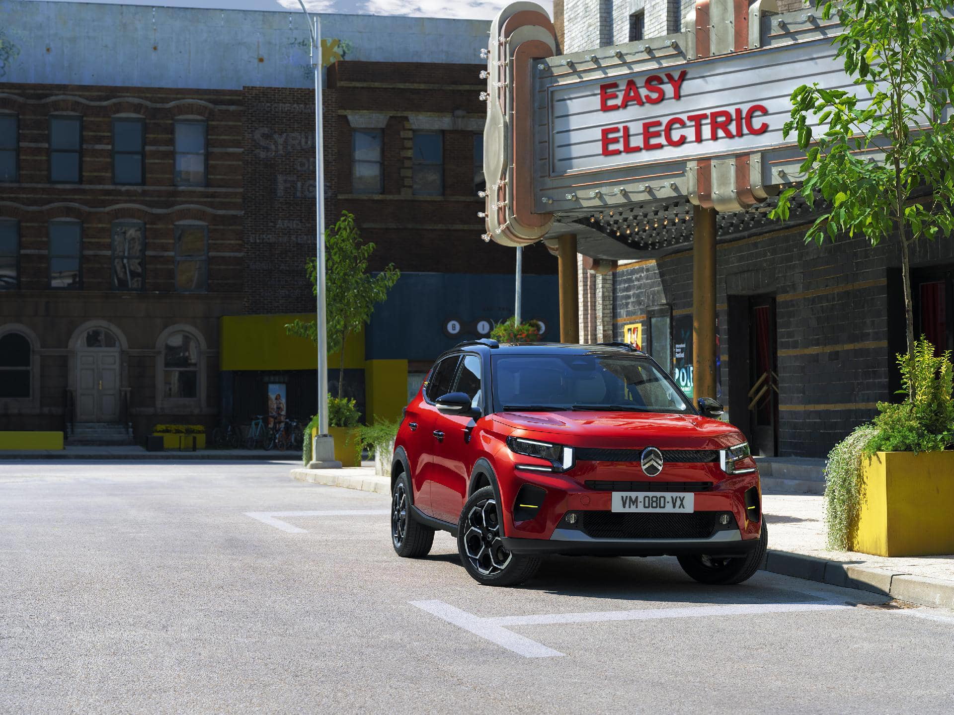 Citroën C3 rojo vista lateral con un diseño contemporáneo y líneas dinámicas.