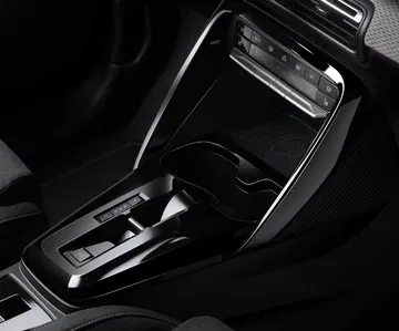 Close-up de la consola central del Citroën C3 mostrando acabados y controles.