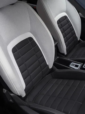 Vista parcial del diseño y tapizado de los asientos delanteros del Citroën C3.