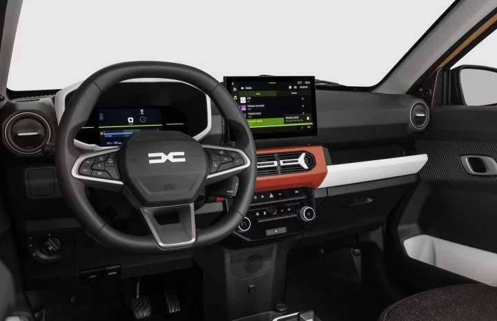 Vista del volante y sistema de infotenimiento del Dacia Spring.