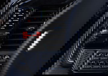 Panel de control de la suspensión y modos de conducción del Chevrolet Silverado.