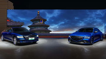 El Genesis G80 EV en magma 2024 posa con elegancia y poderío, destacando su frontal y silueta lateral.